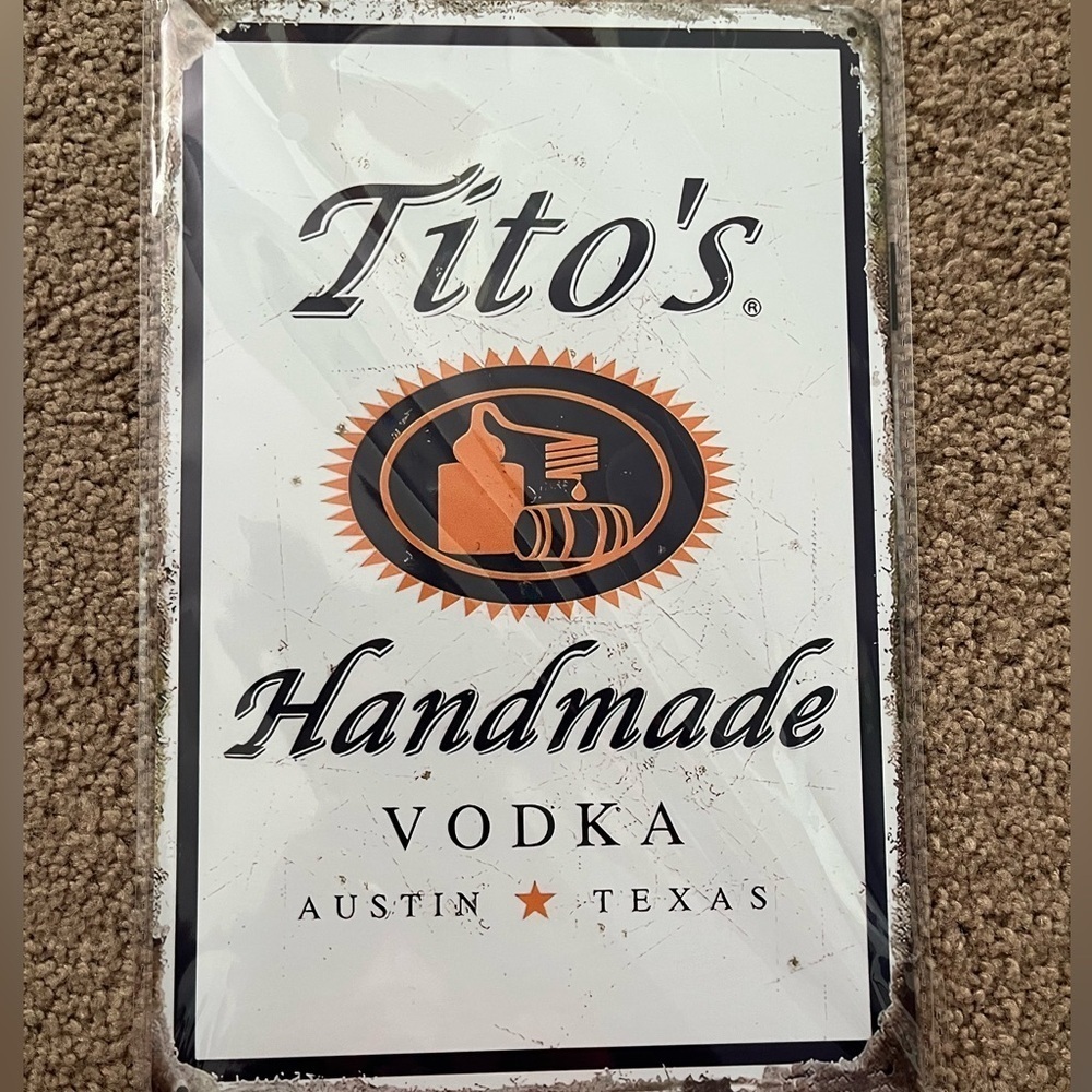 Tito’s wall sign